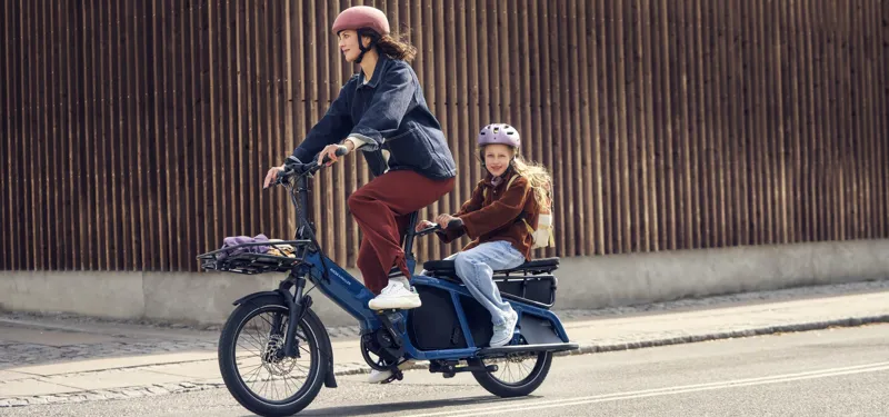 Carries two kids, the bags, and the week's shopping — and still feels like a bike.The New Multitinker